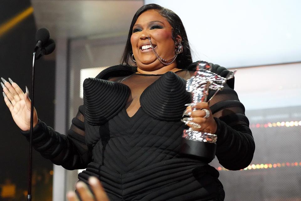 Lizzo accepts the Video For Good award for 'About Damn Time' at the 2022 MTV VMAs at Prudential Center on August 28, 2022 in Newark, New Jersey.