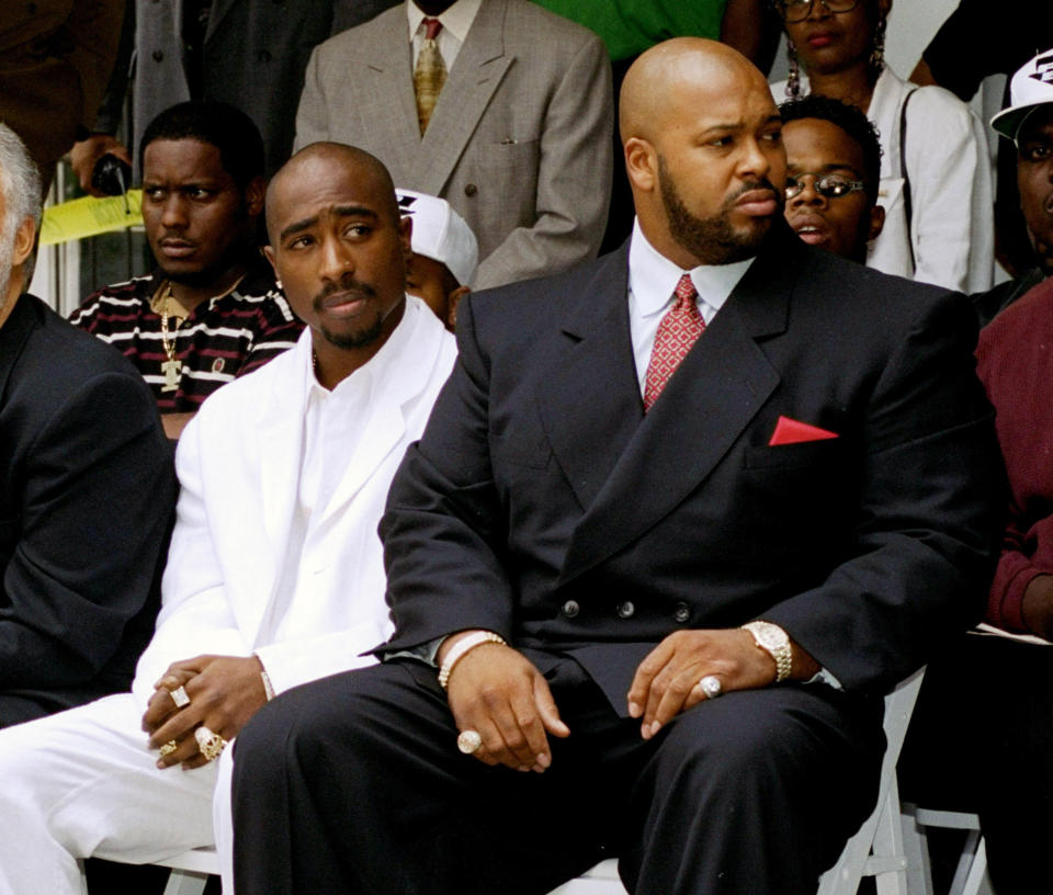 FILE - Rapper Tupac Shakur, left, and Death Row Records Chairman Marion Suge Knight, attend a voter registration event in South Central Los Angeles, on Aug. 15, 1996. Shakur died on Sept. 13, 1996, the victim of a drive-by shooting in Las Vegas. Police have made an arrest for the killing of Shakur. . (AP Photo/Frank Wiese/File)