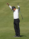 S.H. Kim, of South Korea, reacts after holing out from the 14th fairway of the Silverado Resort North Course for an eagle during the first round of the Fortinet Championship PGA golf tournament in Napa, Calif., Thursday, Sept. 14, 2023. (AP Photo/Eric Risberg)