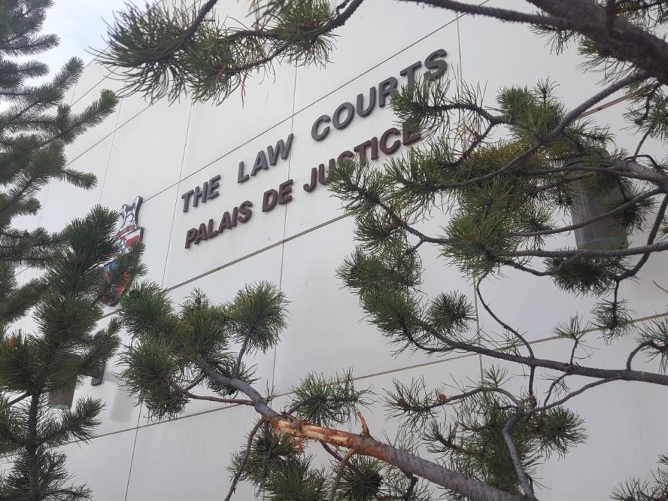 The Yukon courthouse in Whitehorse. A child and parents have filed a statement of claim to the Yukon Supreme Court alleging that the child was sexually abused by former Hidden Valley educational assistant William Auclair-Bellemare, and that the government and RCMP failed to act to prevent or stop it. (Paul Tukker/CBC - image credit)