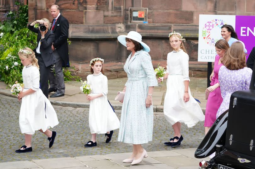 A guest arrives for the wedding of Hugh Grosvenor, the Duke of Westminster, to Olivia Henson at Chester Cathedral