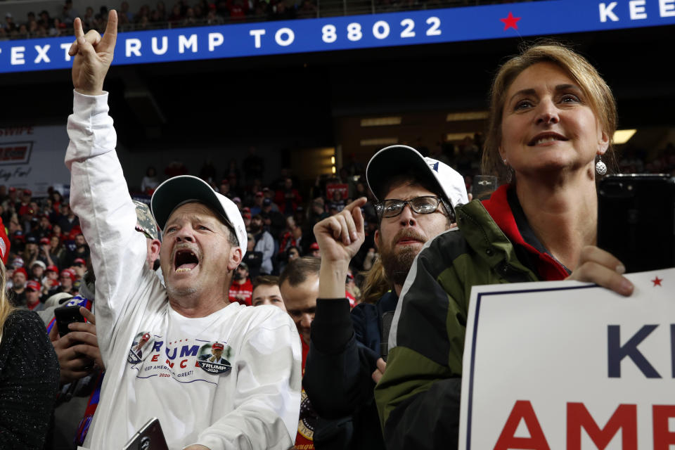 Supporters of President Donald Trump listen as he speaks at a campaign rally, Thursday, Jan. 9, 2020, in Toledo, Ohio. (AP Photo/ Jacquelyn Martin)