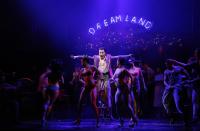 Jon Jon Briones (C) performs as The Engineer with other cast members during a photocall for a new production of "Miss Saigon" at the Prince Edward Theatre in London May 19, 2014. The production marks the 25th anniversary of the musical by Claude-Michel Schonberg and Alain Boubil. REUTERS/Luke MacGregor (BRITAIN - Tags: ENTERTAINMENT)