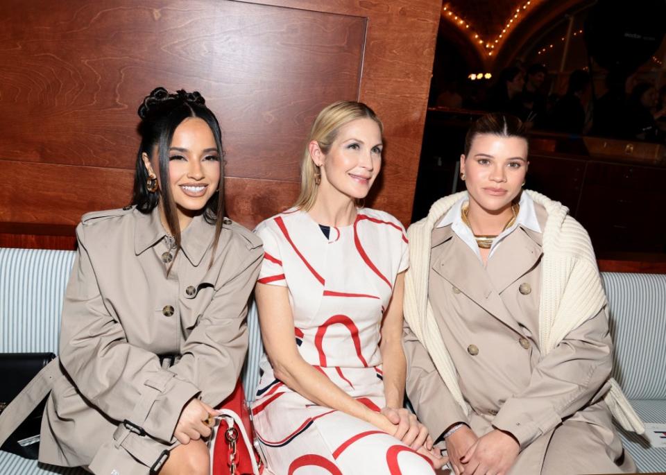 (From left) Becky G, Kelly Rutherford, and Sofia Richie Grainge pose at Tommy Hilfiger’s triumphant NYFW show. Getty Images
