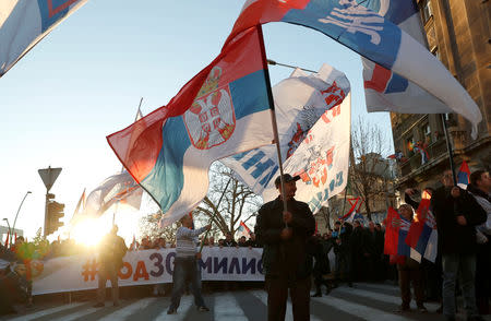 Supporters of Serbian President Aleksandar Vucic and Russian President Vladimir Putin walk towards St Sava temple in Belgrade, Serbia, January 17, 2019. REUTERS/Bernadett Szabo