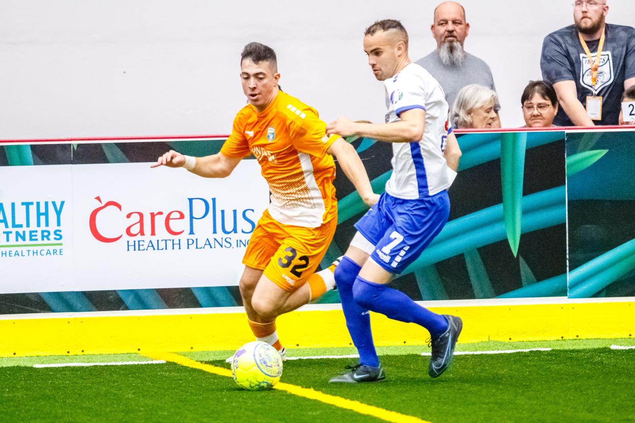 Florida Tropics Breno Oliveria, pictured on the left, competes vs. the Kansas City Comets at the RP Funding Center in Lakeland Florida on Saturday April 23 2022 in a MASL Semifinal Playoff Game 2.