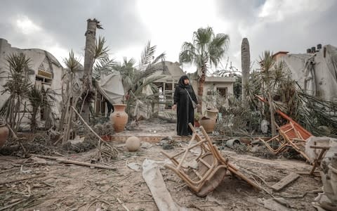 Buildings belonging to the Gaza municipality are seen after after Israeli fighter jets pounded Al Katiba region in Gaza City - Credit:  Anadolu