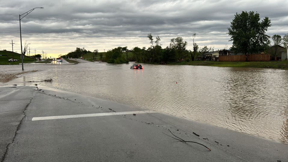 In an image shared by the Omaha Police Department on May 21, 2024, flooding is seen at West Maple at Elkhorn Drive. - Omaha Police Department