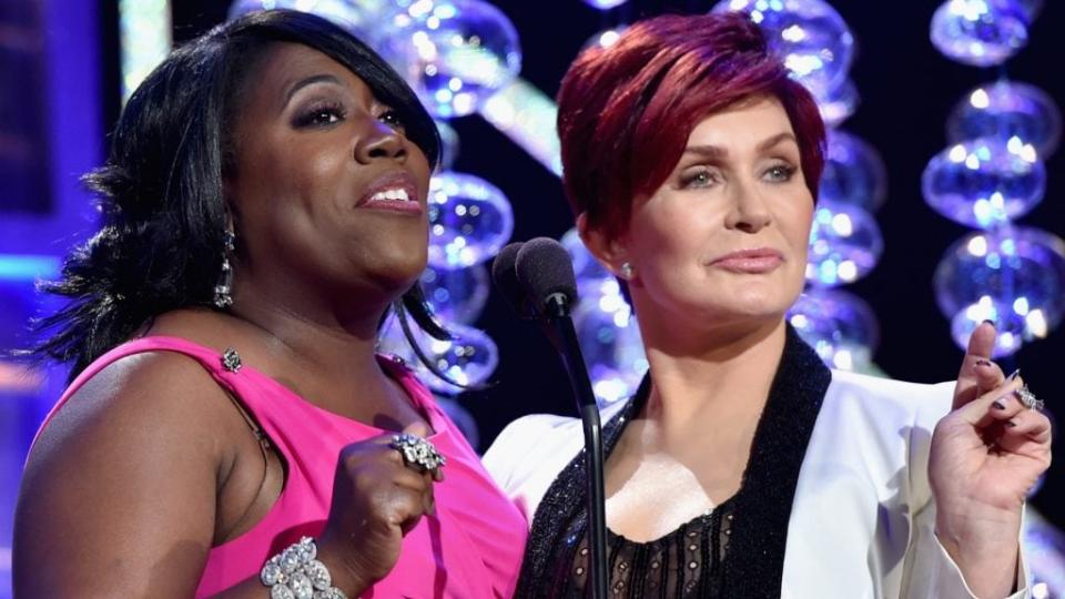 TV personalities Sheryl Underwood (left) and Sharon Osbourne, two hostesses of “The Talk” on CBS, speak onstage during The 41st Annual Daytime Emmy Awards. (Photo by Alberto E. Rodriguez/Getty Images for NATAS)