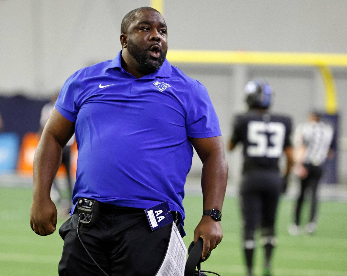 North Crowley head coach Ray Gates gets excited after another turnover in the first half of a UIL Class 6A Division 1 football regional-round playoff game at The Ford Center in Frisco, Texas, Saturday, Oct. 25, 2023.