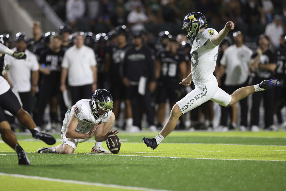 Air Force's Matthew Dapore (43) kicks a field goal against Hawaii during the first half of an NCAA college football game Saturday, Nov. 11, 2023, in Honolulu. (AP Photo/Marco Garcia)