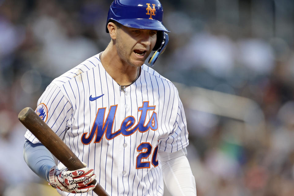 New York Mets' Pete Alonso reacts after striking out looking against the Atlanta Braves during the first inning of a baseball game on Sunday, Aug. 13, 2023, in New York. (AP Photo/Adam Hunger)