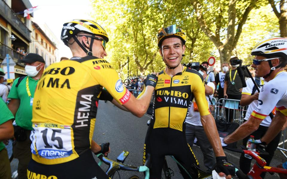 Belgian rider Wout Van Aert (C) of Team Jumbo-Visma celebrates with teammate Robert Gesink (L) after winning the 7th stage of the Tour de France cycling race over 168km from Millau to Lavaur, France, 04 September 2020.  - STEPHANE MANTEY/POOL/EPA-EFE/Shutterstock