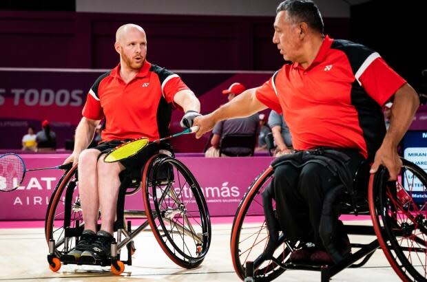 Peter and para-badminton partner Bernard Lapointe, left. 