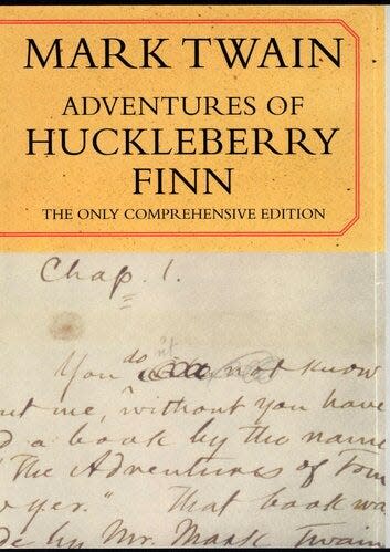 Book cover: The Adventures of Huckleberry Finn by Mark Twain