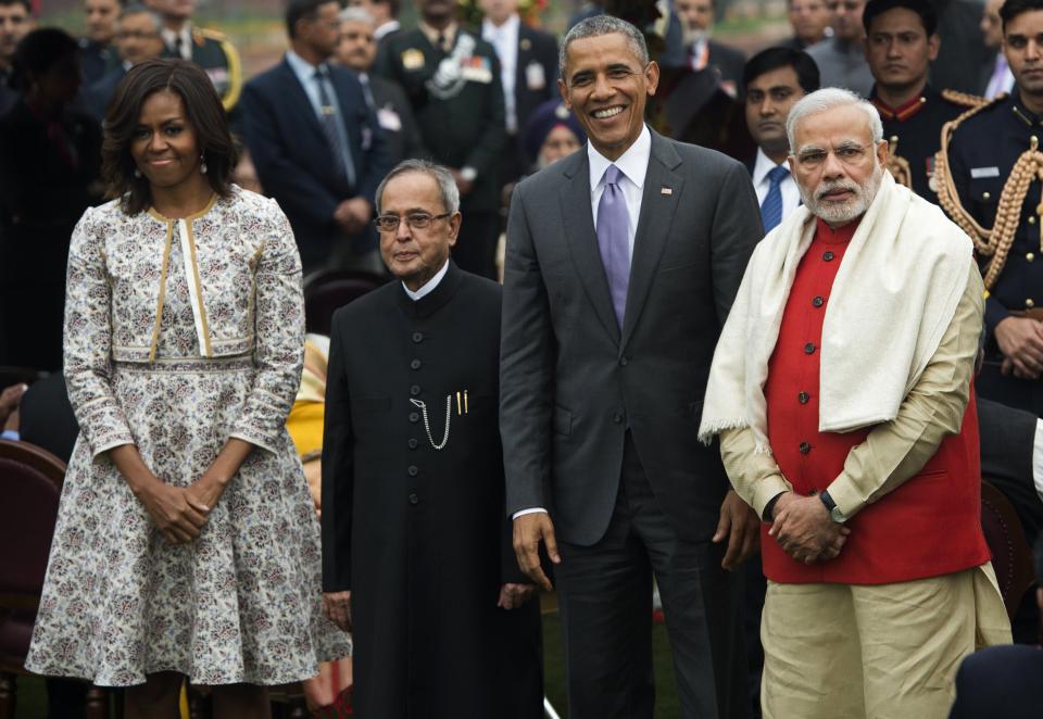 U.S. President Barack Obama; Indian Prime Minister Narendra Modi, right; Indian President Pranab Mukherjee, second from the left; and First Lady Michelle Obama attend a reception at Rashtrapati Bhawan, the Presidential Palace, in New Delhi on Jan. 26, 2015. | Saul Loeb–AFP/Getty Images