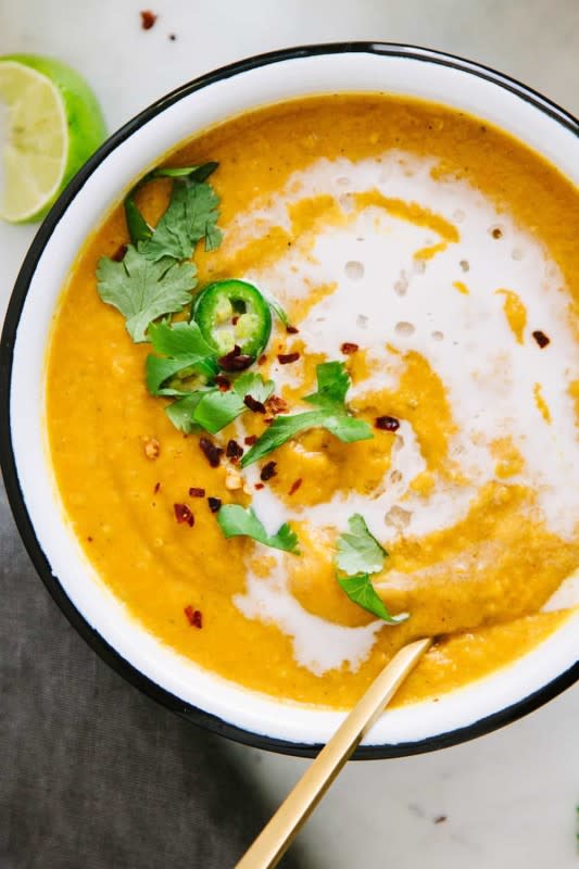 <p>Simple Veganista</p><p>This glowing curry sweet potato and red lentil soup recipe feature nourishing sweet potatoes and protein-rich red lentils, simmered together with a tart green apple, aromatic ginger, curry, cilantro, onion, garlic and coconut milk!</p><p><strong>Get the recipe: <a href="https://simple-veganista.com/curry-sweet-potato-red-lentil-soup/" rel="nofollow noopener" target="_blank" data-ylk="slk:Curry Sweet Potato and Red Lentil Soup;elm:context_link;itc:0;sec:content-canvas" class="link ">Curry Sweet Potato and Red Lentil Soup</a></strong></p>