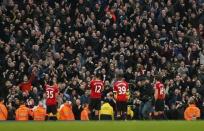 Football Soccer - Manchester City v Manchester United - Barclays Premier League - Etihad Stadium - 20/3/16 Manchester United fans celebrate with players at the end of the match Action Images via Reuters / Jason Cairnduff Livepic