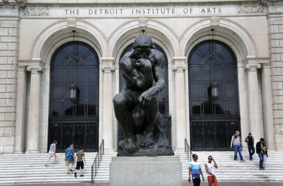 The Thinker by Auguste Rodin in front of the Detroit Institute of Arts in Detroit on Thursday, May 30, 2013.