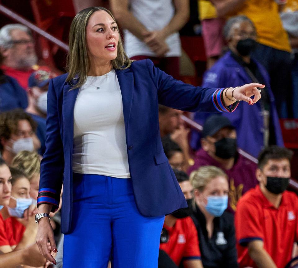 Arizona Wildcats head coach Adia Barnes calls to her team from the sidelines against ASU at Desert Financial Arena in Tempe, Ariz. on Friday, Feb. 11, 2022. Mandatory Credit: Alex Gould - The Republic