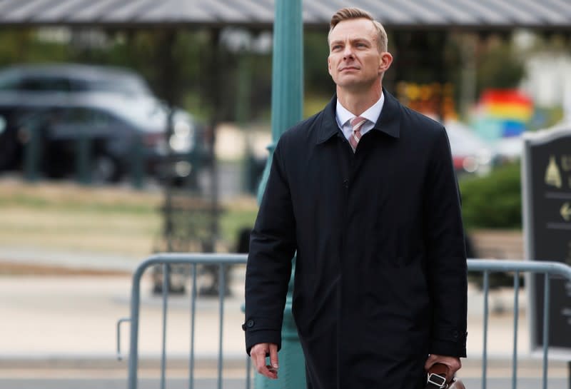 David Holmes, the counselor for Political Affairs at the U.S. embassy in Ukraine, arrives to appear for a closed-door deposition as part of the impeachment inquiry into U.S. President Donald Trump on Capitol Hill in Washington