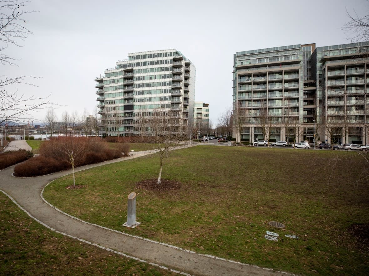 The field in Hinge Park in the Olympic Village has been the proposed site for an elementary school for many years, but to date, no funding has been committed to the project.  (Ben Nelms/CBC - image credit)