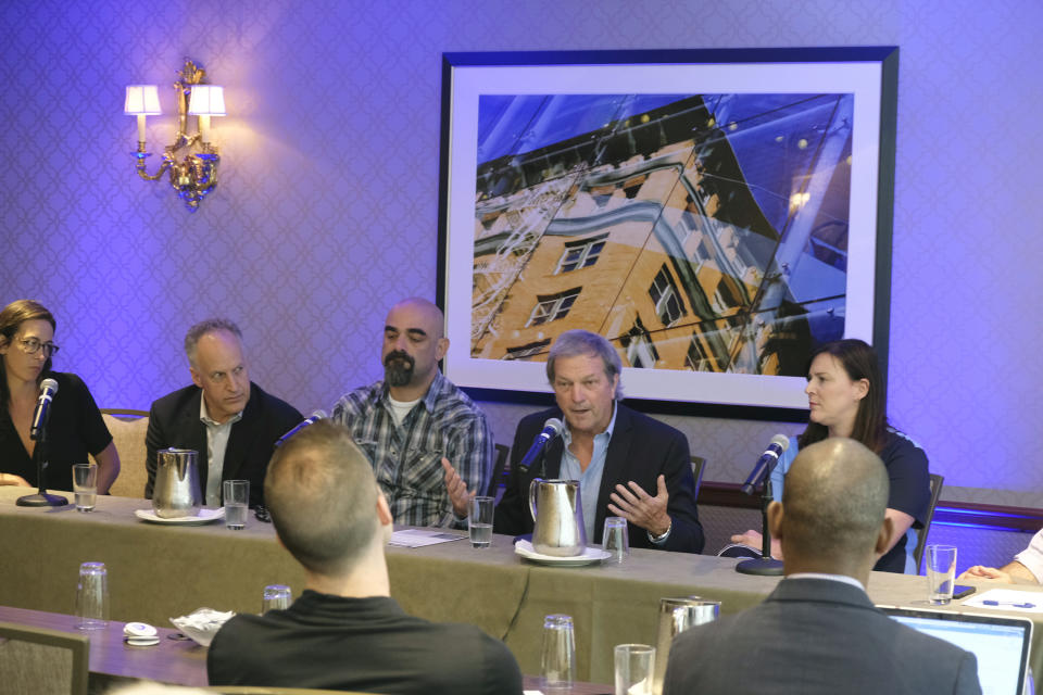 In this July 31, 2019, photo, Congressman Mark DeSaulnier gestures while holding a meeting on saving local news with panelists from Bay Area news outlets in San Francisco. "It is really shocking that the place with the demographics and the business and the universities and the progressiveness, that this is a news desert ... " said DeSaulnier, a Democrat who represents a significant part of the East Bay. (AP Photo/Eric Risberg)