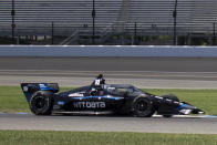 FILE - In this image provided by Jimmie Johnson Racing II, Inc., seven-time NASCAR champion Jimmie Johnson rounds the road course during IndyCar testing with Chip Ganassi Racing at Indianapolis Motor Speedway, Tuesday, July 28, 2020, in Indianapolis. Jimmie Johnson will transition from NASCAR to IndyCar with Chip Ganassi Racing in a partnership that could pair two of the most dominant drivers of this generation on one team. The seven-time NASCAR champion will work with the Ganassi organization to finalize sponsorship on a two-year program for Johnson to run the road and street course races on IndyCar's schedule. If funding is secured, Johnson would be teammates with five-time IndyCar champion Scott Dixon. (Jimmie Johnson Racing II, Inc. via AP, File)