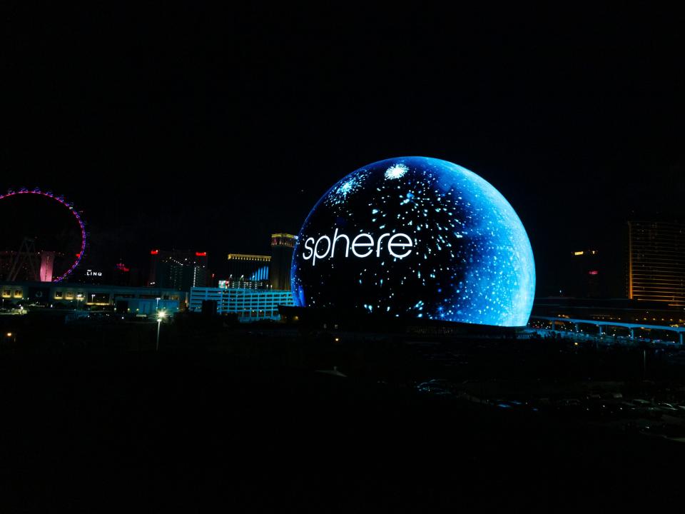 The Sphere lit up with "sphere" written across.