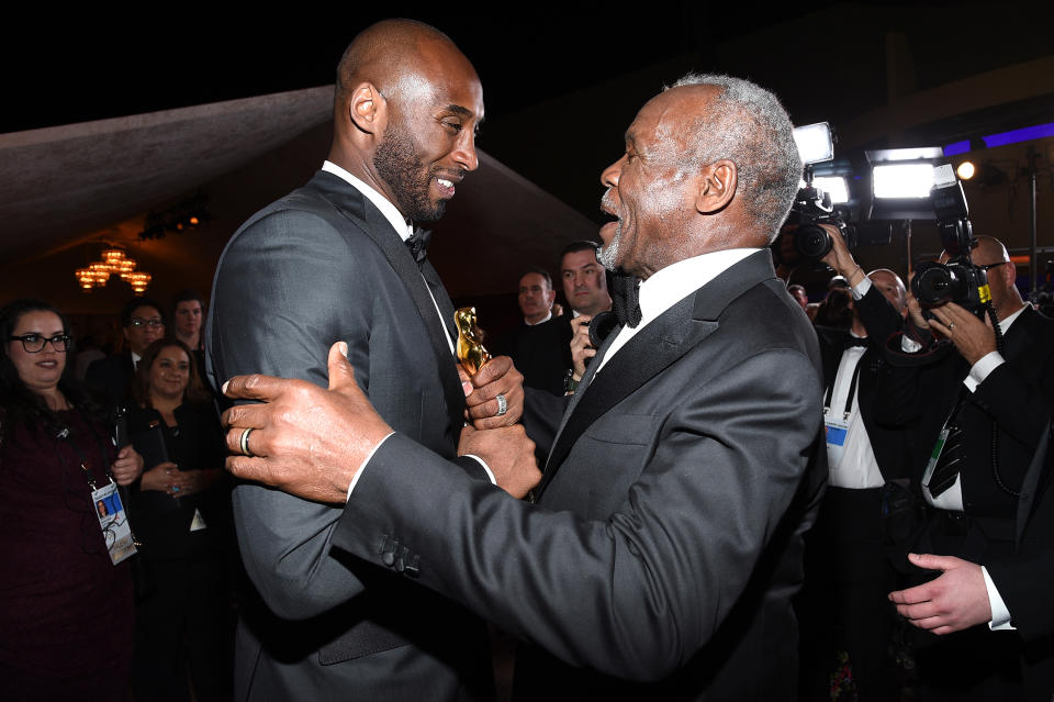 <p>Danny Glover congratulated Bryant on his Oscar win at the Governors Ball. (Photo: Kevork Djansezian/Getty Images) </p>