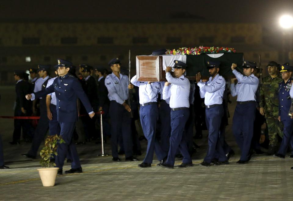 Soldiers carry the casket of Pakistan Air Force flying officer Marium Mukhtiar during a funeral at the PAF Base Faisal in Karachi
