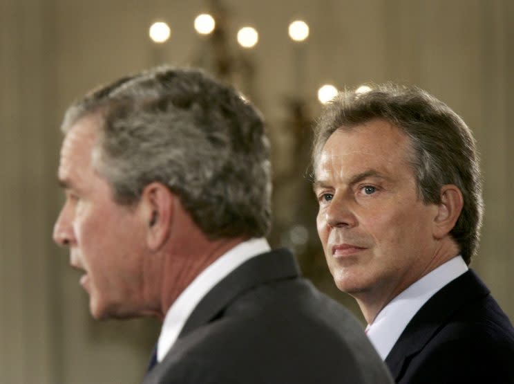 Former British Prime Minister Tony Blair looks on as President George W. Bush speaks at the White House in June 2005. (Photo: Jason Reed/Reuters/File)