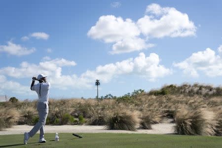 December 1, 2017; New Providence, The Bahamas; Tiger Woods hits his tee shot on the second hole during the second round of the Hero World Challenge golf tournament at Albany. Kyle Terada-USA TODAY Sports