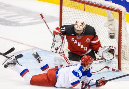 TORONTO, ON - JANUARY 05: Zach Fucale #31 of Canada makes a huge save against Ivan Fishenko #17of Russia during the Gold medal game of the 2015 IIHF World Junior Championship on January 05, 2015 at the Air Canada Centre in Toronto, Ontario, Canada. (Photo by Dennis Pajot/Getty Images)