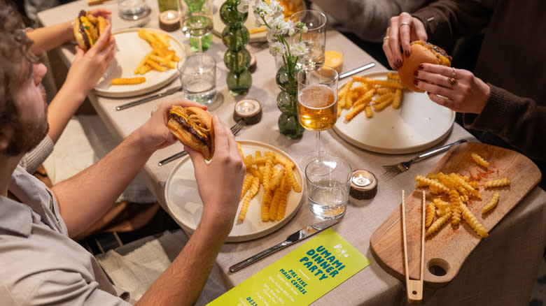 Group eating burgers and fries