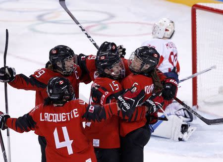 Women Preliminary Round Match - Canada v Olympic Athletes from Russia - Gangneung Hockey Centre, Gangneung, South Korea – February 11, 2018 - Rebecca Johnston of Canada celebrates a goal with her team mates. REUTERS/Brian Snyder