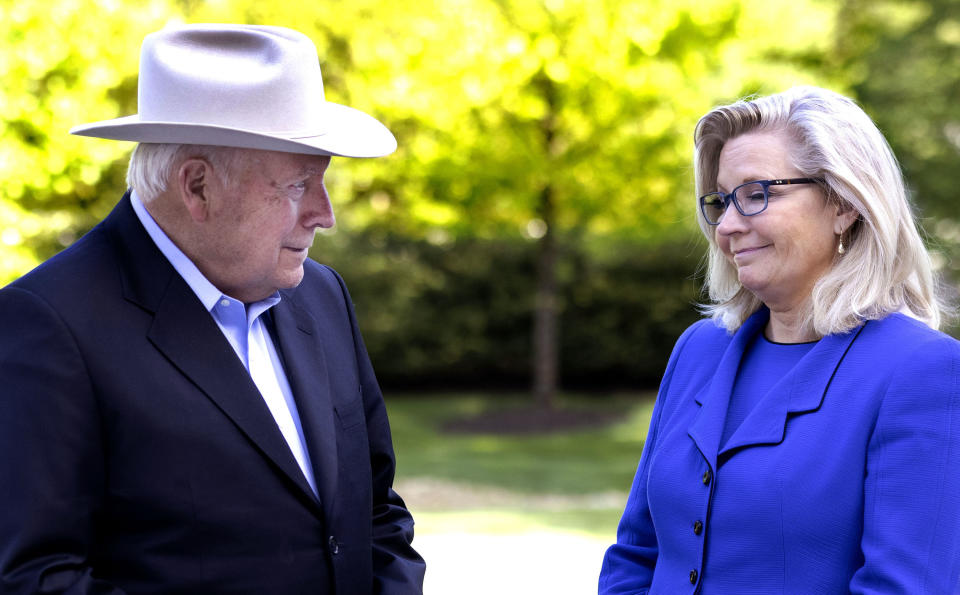 Rep. Liz Cheney with her father, former Vice President Dick Cheney, at his house in Virginia after she was ousted from her GOP leadership role on May 12, 2021. 