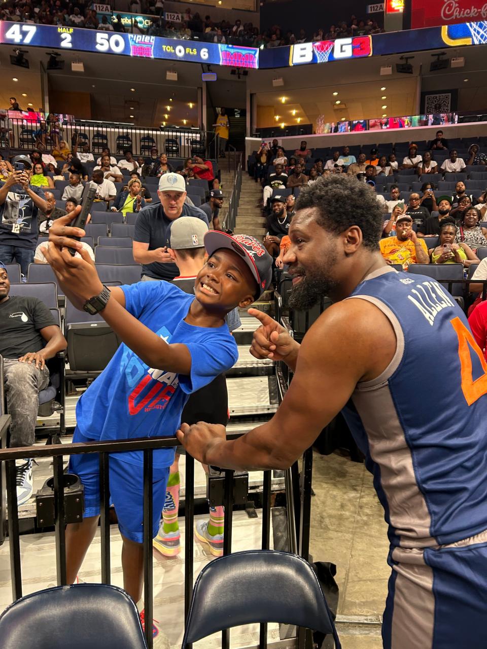 Tony Allen poses with a fan at FedExForum during the Memphis Big3 basketball stop on Saturday July 15, 2023.