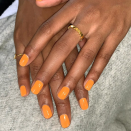 If you're nail-art-averse but still want to get into the spirit, go with a classic pumpkin orange like <a href="https://shop-links.co/1719505344305622015" rel="nofollow noopener" target="_blank" data-ylk="slk:OPI's Suzi Needs a Loch Smith.;elm:context_link;itc:0;sec:content-canvas" class="link ">OPI's Suzi Needs a Loch Smith.</a>