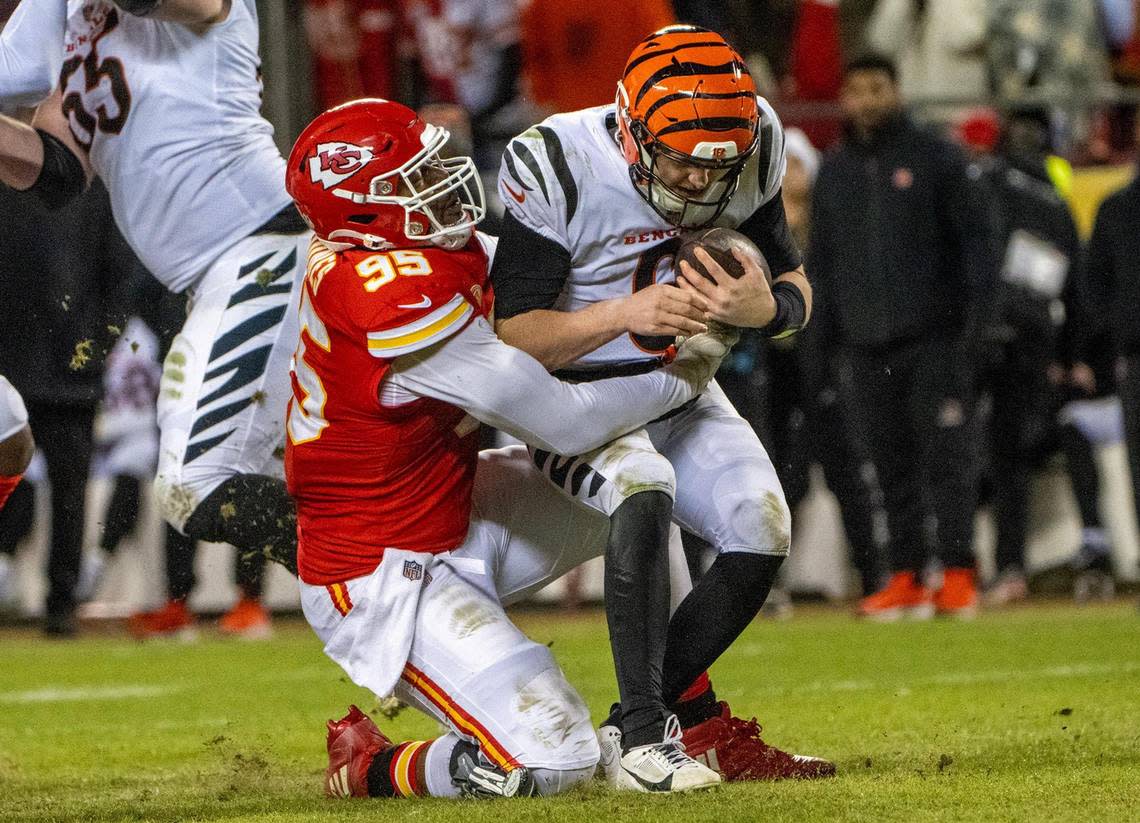 Kansas City Chiefs defensive tackle Chris Jones (95) sacks Cincinnati Bengals quarterback Jake Browning (6) in the second half against the Cincinnati Bengals game on Sunday, Dec. 31, 2023, at GEHA Field at Arrowhead Stadium.