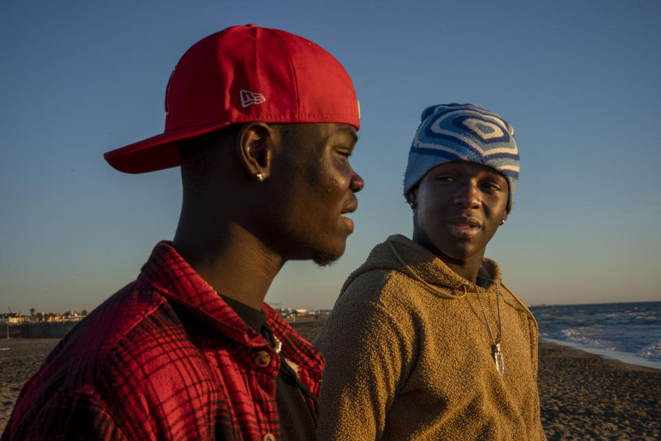 Senegalese actors Seydou Sarr, right, and Moustapha Fall pose for portraits for the movie Io Capitano (Me Captain) in Fregene, near Rome, Saturday, Feb. 3, 2024. Both of them act in Matteo Garrone's Io Capitano (Me Captain) 96th Academy Awards-nominee in the International Feature Film category that is inspired by Mamadou Kouassi, a migrant who made the journey from his native Ivory Coast to Italy and now dedicates his life to working with migrants in Castel Volturno, an impoverished city near Naples in southern Italy where thousands of migrants from Africa live. (AP Photo/Domenico Stinellis)