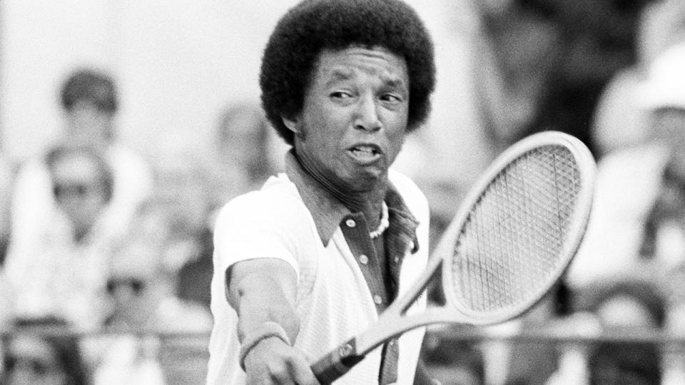 Arthur Ashe, pictured here in action at Wimbledon in 1975.