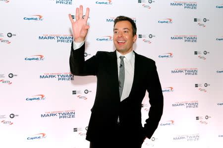 Comedian and television host Jimmy Fallon arrives on the red carpet for the taping of the Mark Twain Prize for Humor ceremony and performance, honoring comedian Jay Leno, at the Kennedy Center in Washington October 19, 2014. REUTERS/Jonathan Ernst/File Photo