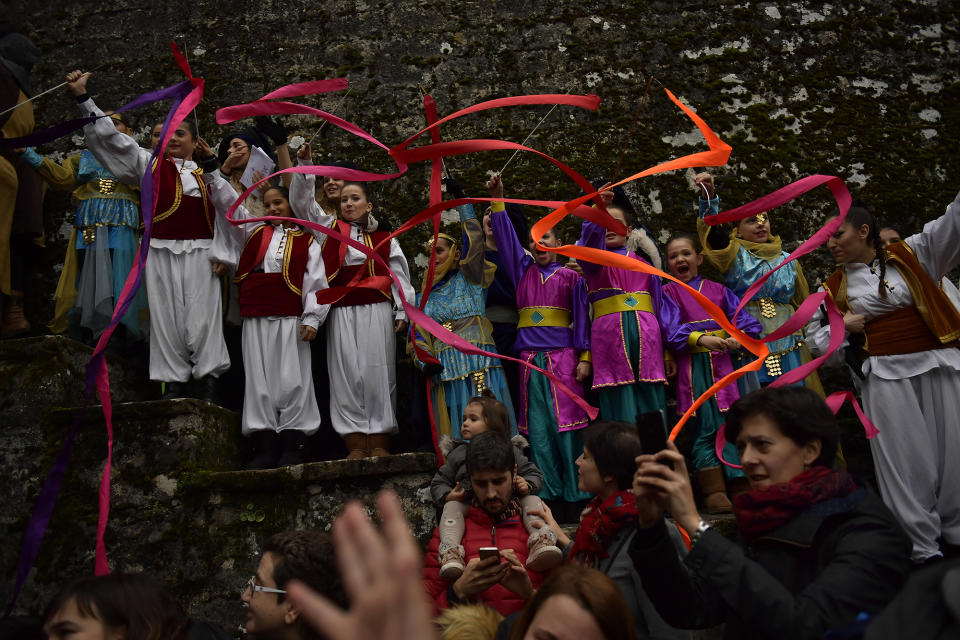 <p>People wave the Three Kings as they arrive to the old city during The Cabalgata Los Reyes Magos (Cavalcade of the three kings) the day before Epiphany, in Pamplona, northern Spain, Friday, Jan. 5, 2018. The parade symbolizes the coming of the Magi to Bethlehem following the birth of Jesus, marked in Spain and many Latin American countries Epiphany is the day when gifts are exchanged. (Photo: Alvaro Barrientos/AP) </p>