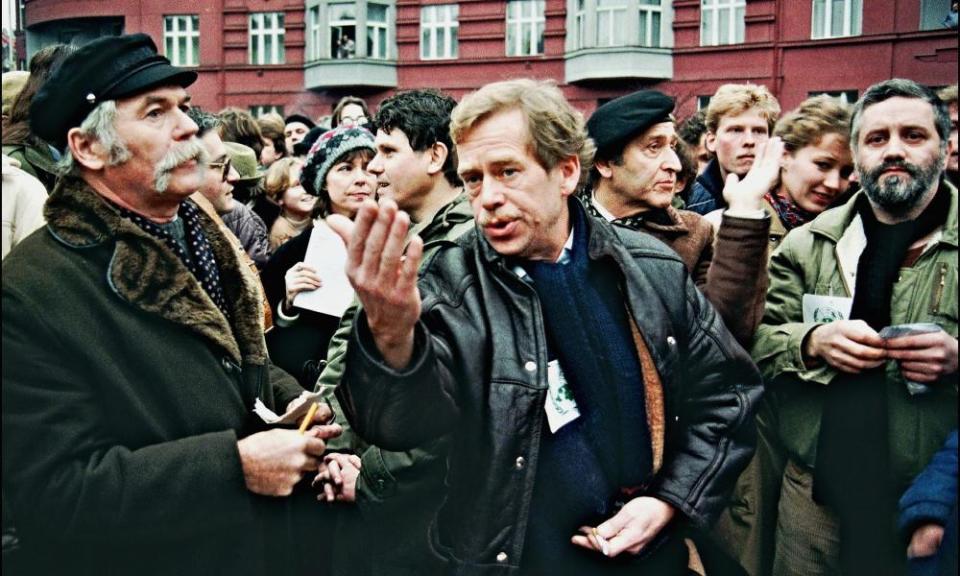 Vaclav Havel, centre, in discussion at a demonstration in Prague on 10 December 1988.