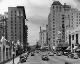 <p>The Pantages Theatre can be seen looking down Hollywood Boulevard. It's endearingly nicknamed "Broadway in Hollywood." </p>