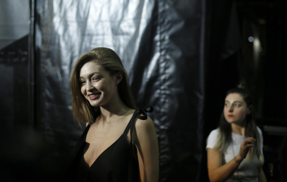 Model Gigi Hadid walks backstage prior to the Off-White ready to wear Fall-Winter 2019-2020 collection, that was presented in Paris, Thursday, Feb. 28, 2019. (AP Photo/Thibault Camus)