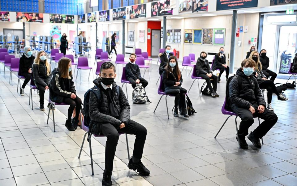 Students of Rosshall Academy in Glasgow, Scotland, wearing face masks - Jeff J Mitchell/Getty Images