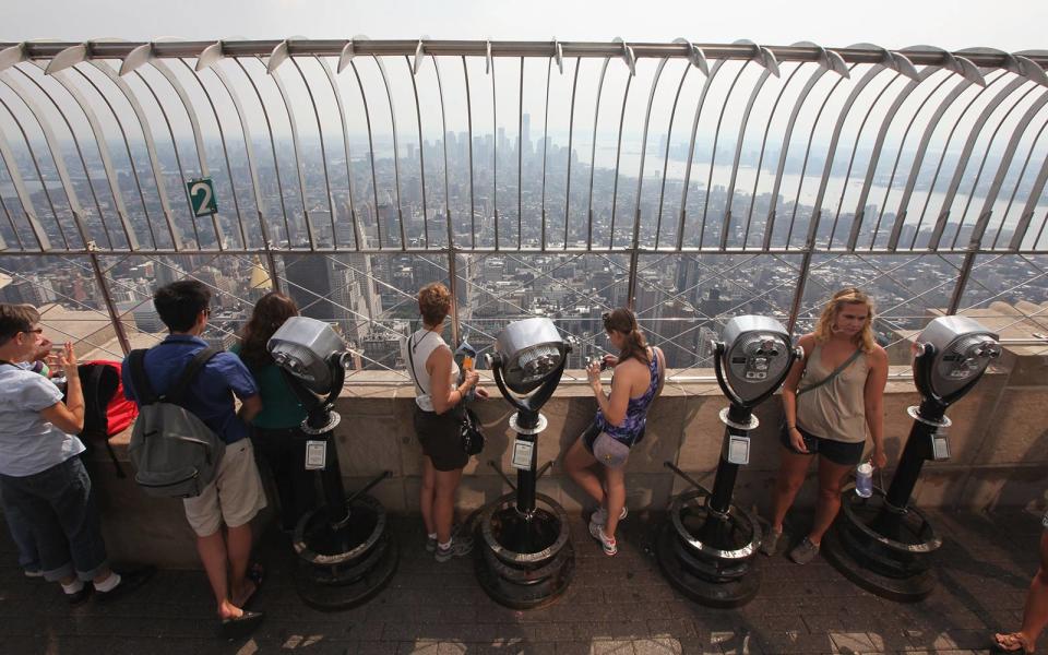 <p>The observation decks of the Empire State Building are open every day of the year, from 8 a.m. to 2 a.m. Visitors enter through the expansive lobby, which includes a striking marble depiction of the building, and a ceiling mural that was damaged when the building was modernized in the 1960s, and restored to its original splendor in 2009 after two years of work by artisans and historians.</p> <p>On the second floor, visitors learn about the building’s recent sustainability upgrades and take an elevator up to the 80th floor, where they can learn about the history of the building before taking another short ride up to the open-air observation deck. On a clear day, the views from the observation deck include not just Central Park and the Statue of Liberty, but five states: New York, New Jersey, Pennsylvania, Connecticut, and Massachusetts. For an extra fee, visitors can take a manually-operated elevator up to the enclosed 102nd floor observatory for an extra-spectacular view.</p>