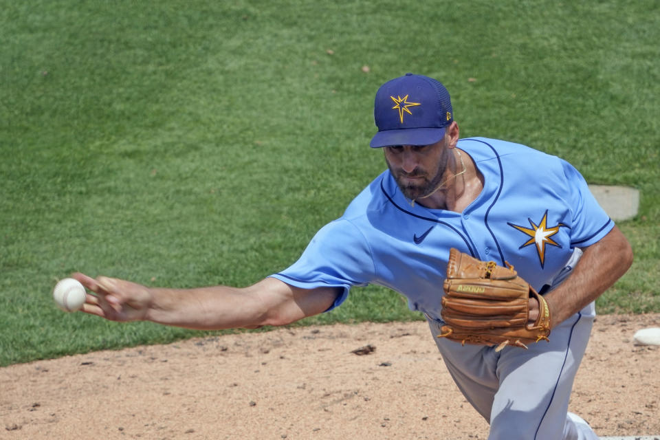 Tampa Bay Rays pitcher Trevor Kelly throws against the Detroit Tigers in the sixth inning of a spring training baseball game, Sunday, March 26, 2023, in Lakeland, Fla. (AP Photo/John Raoux)